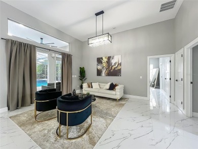 Welcome to a masterpiece of modern design and refined living in on Tuscawilla Country Club in Florida - for sale on GolfHomes.com, golf home, golf lot