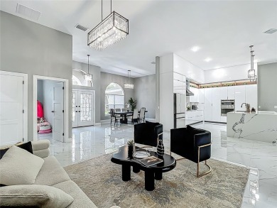Welcome to a masterpiece of modern design and refined living in on Tuscawilla Country Club in Florida - for sale on GolfHomes.com, golf home, golf lot