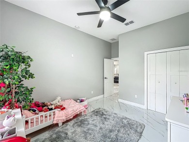Welcome to a masterpiece of modern design and refined living in on Tuscawilla Country Club in Florida - for sale on GolfHomes.com, golf home, golf lot