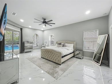Welcome to a masterpiece of modern design and refined living in on Tuscawilla Country Club in Florida - for sale on GolfHomes.com, golf home, golf lot