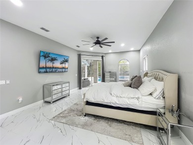 Welcome to a masterpiece of modern design and refined living in on Tuscawilla Country Club in Florida - for sale on GolfHomes.com, golf home, golf lot