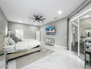 Welcome to a masterpiece of modern design and refined living in on Tuscawilla Country Club in Florida - for sale on GolfHomes.com, golf home, golf lot