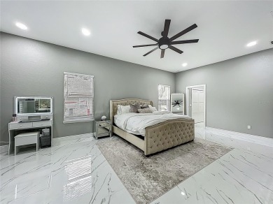 Welcome to a masterpiece of modern design and refined living in on Tuscawilla Country Club in Florida - for sale on GolfHomes.com, golf home, golf lot