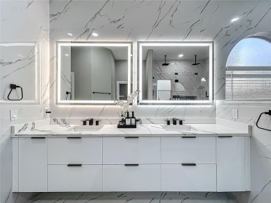 Welcome to a masterpiece of modern design and refined living in on Tuscawilla Country Club in Florida - for sale on GolfHomes.com, golf home, golf lot