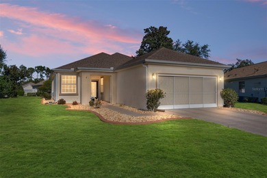 This charming, extremely well maintained KINGSTON Patio home on Eagle Ridge At Spruce Creek Country Club in Florida - for sale on GolfHomes.com, golf home, golf lot
