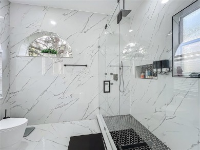 Welcome to a masterpiece of modern design and refined living in on Tuscawilla Country Club in Florida - for sale on GolfHomes.com, golf home, golf lot