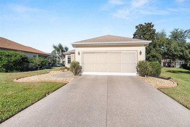 This charming, extremely well maintained KINGSTON Patio home on Eagle Ridge At Spruce Creek Country Club in Florida - for sale on GolfHomes.com, golf home, golf lot