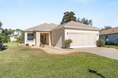 This charming, extremely well maintained KINGSTON Patio home on Eagle Ridge At Spruce Creek Country Club in Florida - for sale on GolfHomes.com, golf home, golf lot
