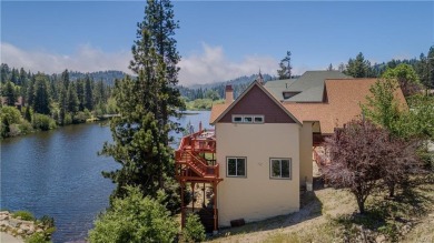 Discover luxury mountain living in this stunning 5-bedroom on Lake Arrowhead Country Club in California - for sale on GolfHomes.com, golf home, golf lot