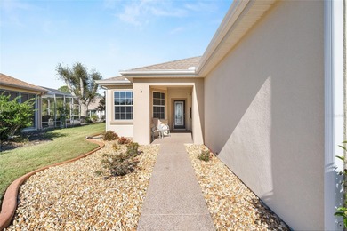 This charming, extremely well maintained KINGSTON Patio home on Eagle Ridge At Spruce Creek Country Club in Florida - for sale on GolfHomes.com, golf home, golf lot