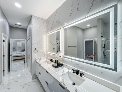 Welcome to a masterpiece of modern design and refined living in on Tuscawilla Country Club in Florida - for sale on GolfHomes.com, golf home, golf lot
