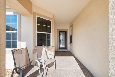 This charming, extremely well maintained KINGSTON Patio home on Eagle Ridge At Spruce Creek Country Club in Florida - for sale on GolfHomes.com, golf home, golf lot