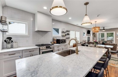 Welcome to this beautifully renovated 3-bedroom, 2-bathroom home on John A. White Golf Course in Georgia - for sale on GolfHomes.com, golf home, golf lot