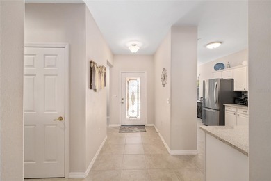 This charming, extremely well maintained KINGSTON Patio home on Eagle Ridge At Spruce Creek Country Club in Florida - for sale on GolfHomes.com, golf home, golf lot