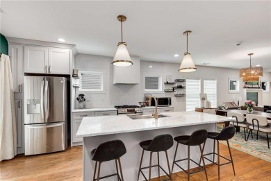 Welcome to this beautifully renovated 3-bedroom, 2-bathroom home on John A. White Golf Course in Georgia - for sale on GolfHomes.com, golf home, golf lot