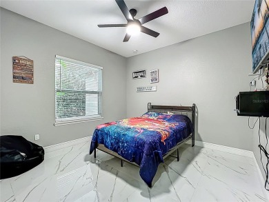 Welcome to a masterpiece of modern design and refined living in on Tuscawilla Country Club in Florida - for sale on GolfHomes.com, golf home, golf lot