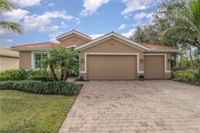 Stunning Golf & Lake Views | Oversized Saltwater Pool | on Herons Glen Golf and Country Club in Florida - for sale on GolfHomes.com, golf home, golf lot