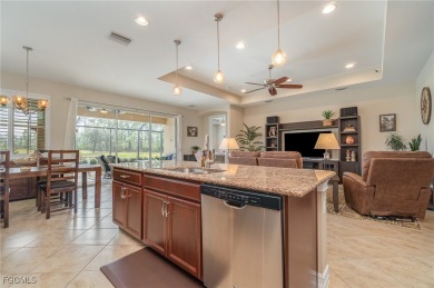 Stunning Golf & Lake Views | Oversized Saltwater Pool | on Herons Glen Golf and Country Club in Florida - for sale on GolfHomes.com, golf home, golf lot