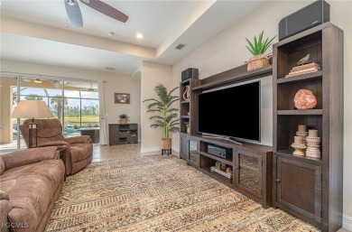 Stunning Golf & Lake Views | Oversized Saltwater Pool | on Herons Glen Golf and Country Club in Florida - for sale on GolfHomes.com, golf home, golf lot