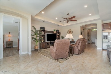 Stunning Golf & Lake Views | Oversized Saltwater Pool | on Herons Glen Golf and Country Club in Florida - for sale on GolfHomes.com, golf home, golf lot