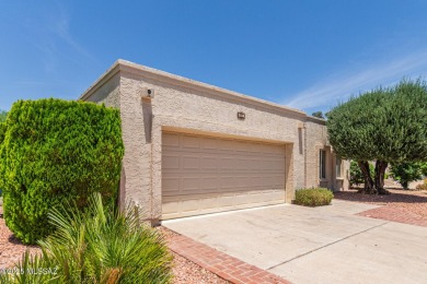 Tucked in a gated 55+ community along the OMNI Tucson National on Omni Tucson National Golf Resort and Spa - Catalina in Arizona - for sale on GolfHomes.com, golf home, golf lot