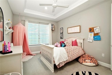 Set on a desirable corner lot in The Place at Corkscrew, this on Old Corkscrew Golf Club in Florida - for sale on GolfHomes.com, golf home, golf lot