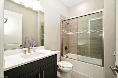 Set on a desirable corner lot in The Place at Corkscrew, this on Old Corkscrew Golf Club in Florida - for sale on GolfHomes.com, golf home, golf lot
