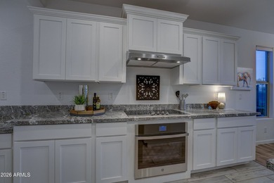 Experience luxury living in the prestigious Trilogy at Verde on Vista Verde Golf Course in Arizona - for sale on GolfHomes.com, golf home, golf lot