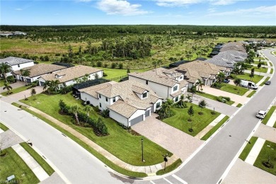 Set on a desirable corner lot in The Place at Corkscrew, this on Old Corkscrew Golf Club in Florida - for sale on GolfHomes.com, golf home, golf lot