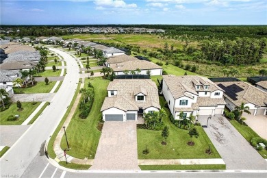 Set on a desirable corner lot in The Place at Corkscrew, this on Old Corkscrew Golf Club in Florida - for sale on GolfHomes.com, golf home, golf lot
