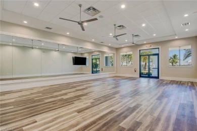 Set on a desirable corner lot in The Place at Corkscrew, this on Old Corkscrew Golf Club in Florida - for sale on GolfHomes.com, golf home, golf lot
