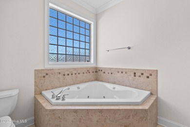 Gorgeous all-brick home in the exclusive Magnolia Greens Golf on Magnolia Greens Golf Plantation in North Carolina - for sale on GolfHomes.com, golf home, golf lot