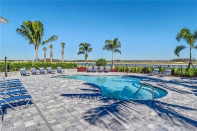 Set on a desirable corner lot in The Place at Corkscrew, this on Old Corkscrew Golf Club in Florida - for sale on GolfHomes.com, golf home, golf lot