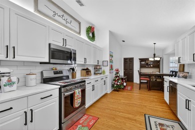 Well-maintained and updated Extended Palm II model in Del Webb on Eagle Ridge At Spruce Creek Country Club in Florida - for sale on GolfHomes.com, golf home, golf lot