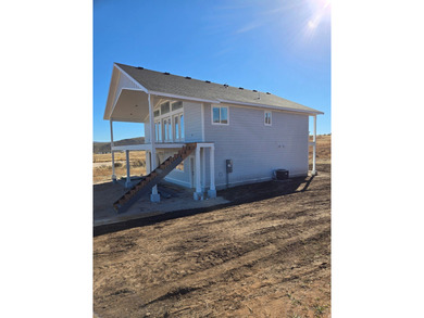 Ready to move in! New lake house with spectacular views of Bear on Bear Lake Golf Course in Utah - for sale on GolfHomes.com, golf home, golf lot