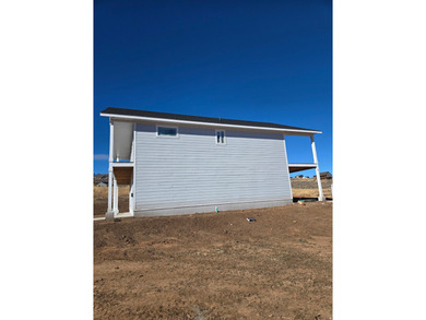 Ready to move in! New lake house with spectacular views of Bear on Bear Lake Golf Course in Utah - for sale on GolfHomes.com, golf home, golf lot