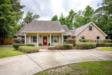 WELCOME HOME!  This beautiful well maintained home sits on a on Diamondhead Country Club in Mississippi - for sale on GolfHomes.com, golf home, golf lot