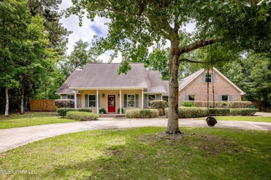 WELCOME HOME!  This beautiful well maintained home sits on a on Diamondhead Country Club in Mississippi - for sale on GolfHomes.com, golf home, golf lot