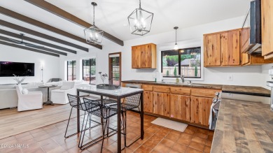 Welcome home to this TURNKEY bright and sunny home situated in on Oakcreek Country Club in Arizona - for sale on GolfHomes.com, golf home, golf lot