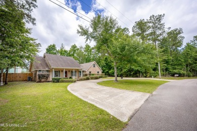 WELCOME HOME!  This beautiful well maintained home sits on a on Diamondhead Country Club in Mississippi - for sale on GolfHomes.com, golf home, golf lot