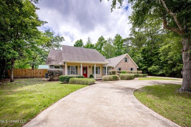 WELCOME HOME!  This beautiful well maintained home sits on a on Diamondhead Country Club in Mississippi - for sale on GolfHomes.com, golf home, golf lot