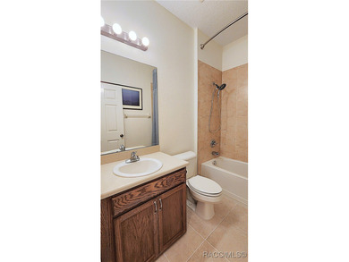 THIS HOME IS TRULY A TRIFECTA! 1-Maintenance-free living in on Brentwood Farms Golf Club in Florida - for sale on GolfHomes.com, golf home, golf lot