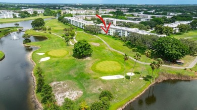 LUXURY FLOOR PLAN, INSIDE FULL SIZE WASHER & DRYER N/S EXPOSURE on Wynmoor Golf Course in Florida - for sale on GolfHomes.com, golf home, golf lot
