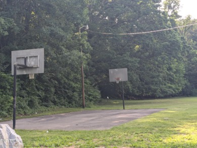 Beautifully Updated Home with added living area in basement on Country Club of Bristol in Tennessee - for sale on GolfHomes.com, golf home, golf lot