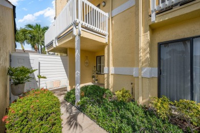 Beautiful lakefront condo just steps from the entrance to on Suntree Country Club in Florida - for sale on GolfHomes.com, golf home, golf lot