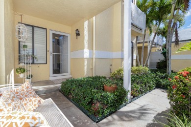 Beautiful lakefront condo just steps from the entrance to on Suntree Country Club in Florida - for sale on GolfHomes.com, golf home, golf lot