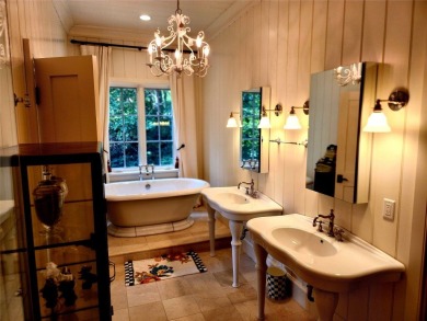 Classic in every sense of the word, this mountain chalet on Lake Toxaway Country Club in North Carolina - for sale on GolfHomes.com, golf home, golf lot