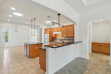 Light, bright and move-in ready! This 2,132 sq.ft. well designed on Quail Creek Country Club  in Arizona - for sale on GolfHomes.com, golf home, golf lot