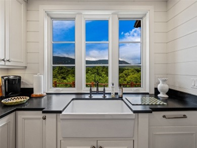 Classic in every sense of the word, this mountain chalet on Lake Toxaway Country Club in North Carolina - for sale on GolfHomes.com, golf home, golf lot