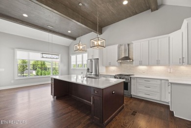 This craftsman style home features 4 bedrooms and 3.5 bathrooms on Tennessee National Golf Club in Tennessee - for sale on GolfHomes.com, golf home, golf lot